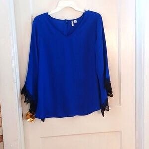 EST. 1946 top women's size medium blue and black